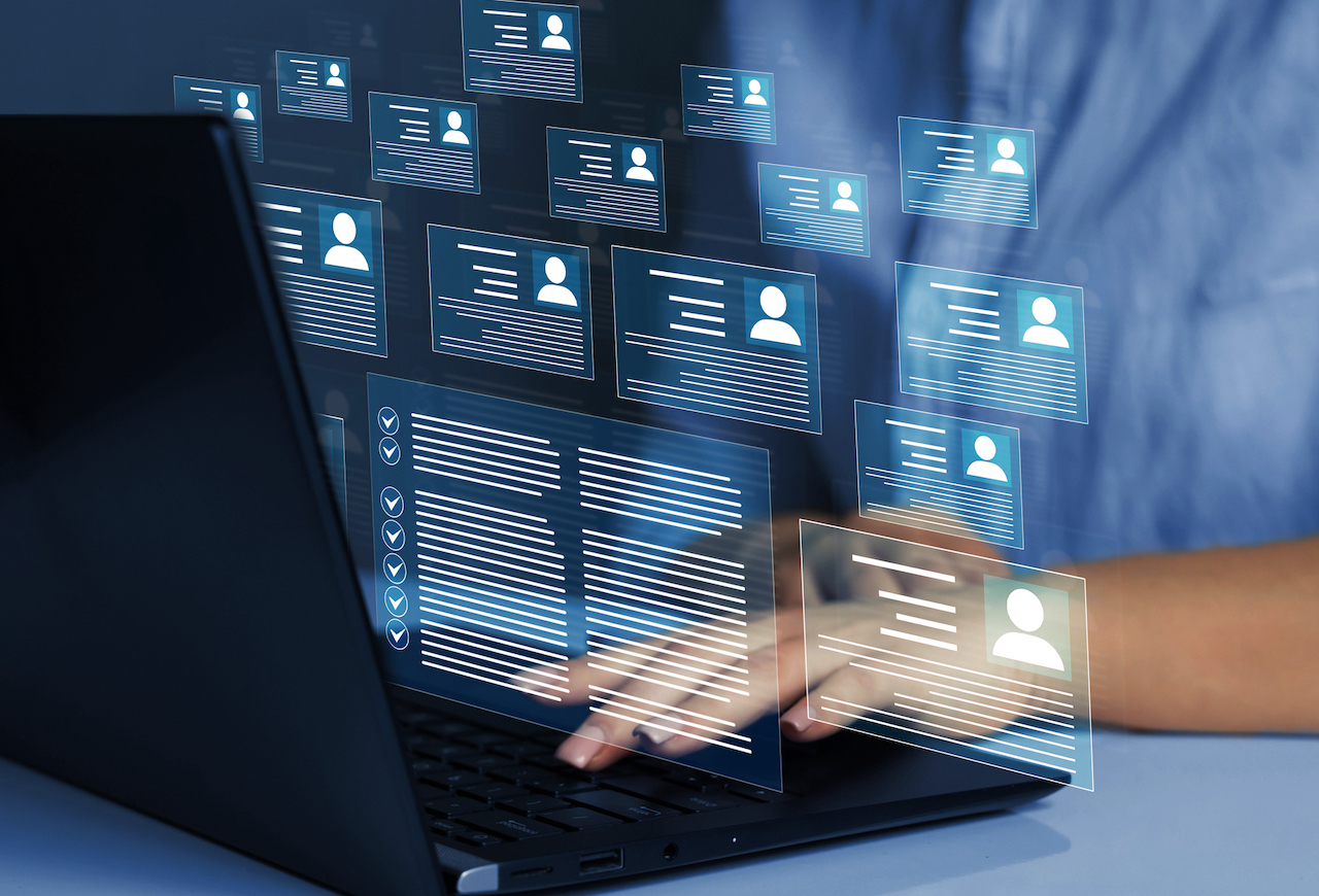 Business person working at laptop computer and digital documents with checkbox lists.Law regulation and compliance rules on virtual screen concept.